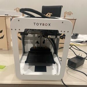 Toybox 3D printer. 1 year old. Barely used.